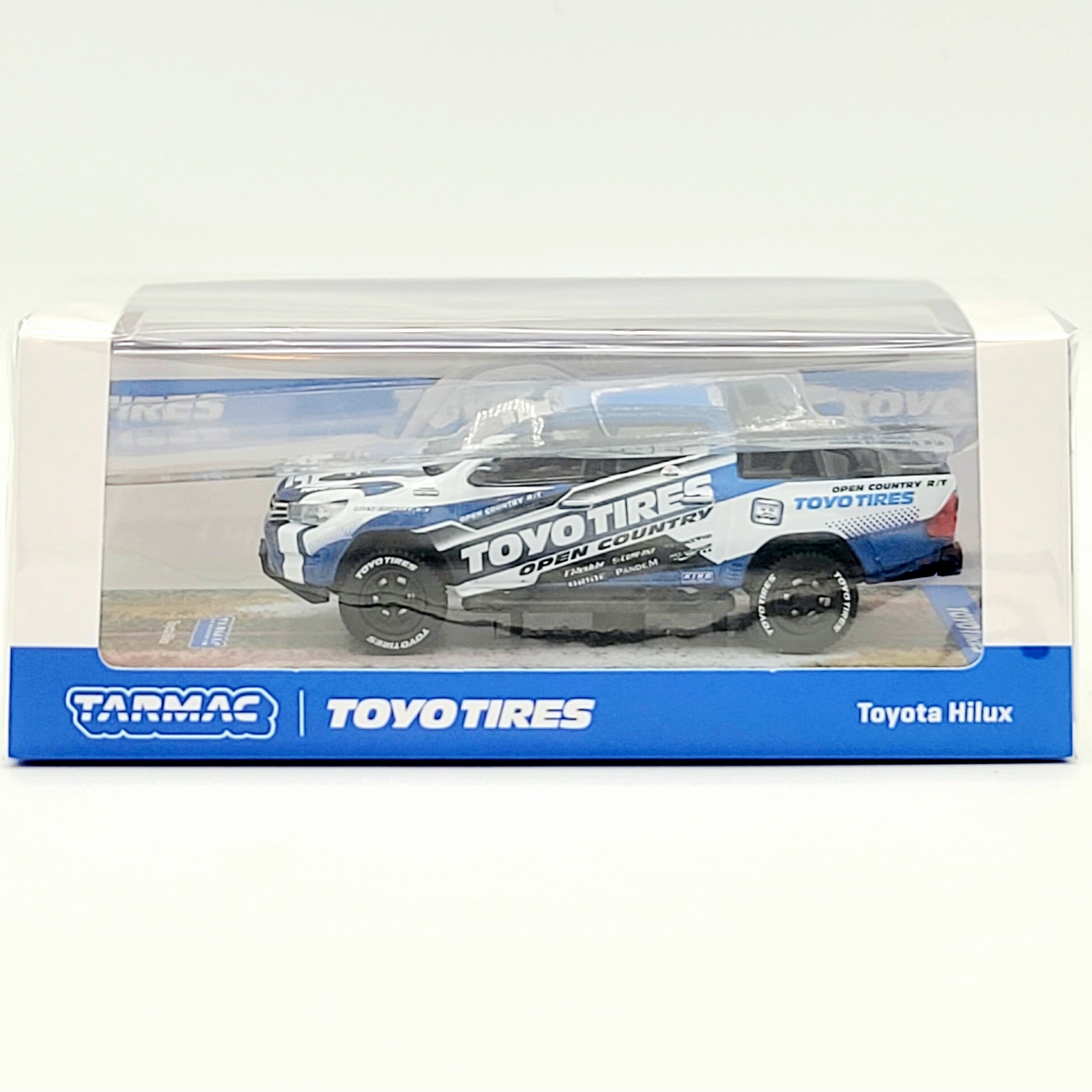 Tarmac Works Toyota Hilux Pickup Truck - 1:64, Toyo Tires (2025 Hobby64)